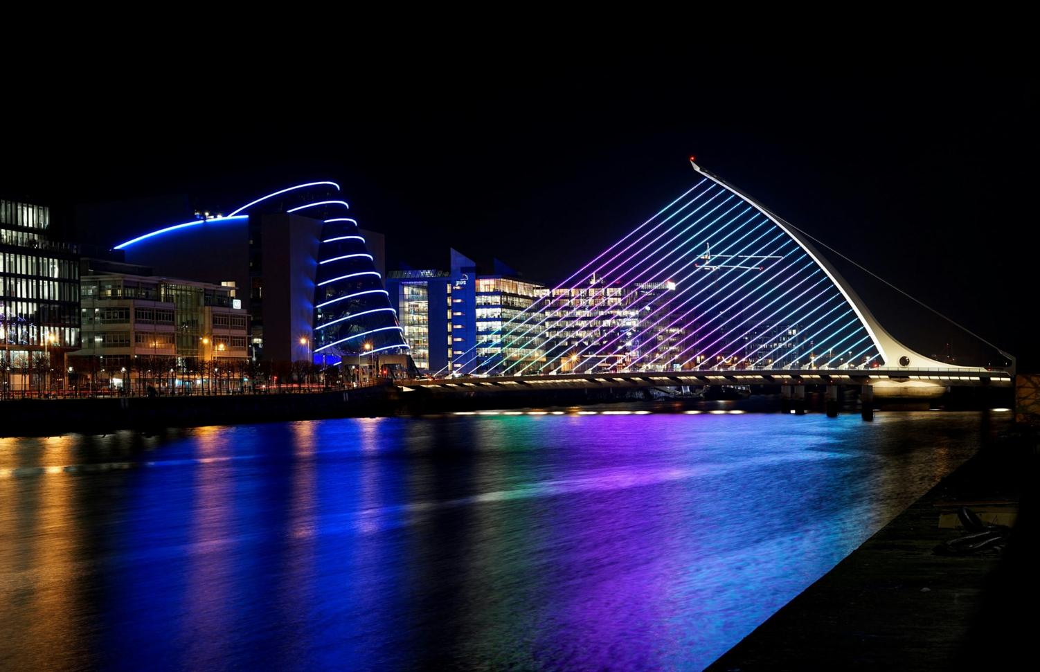 An illuminated bridge in Dublin at night